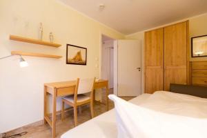 Ein Bett oder Betten in einem Zimmer der Unterkunft Quartier 47, App. 07