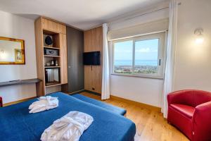 Posteľ alebo postele v izbe v ubytovaní Colleverde Park Hotel