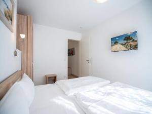 Postel nebo postele na pokoji v ubytování Seeresidenz Haus Baltic, App A02