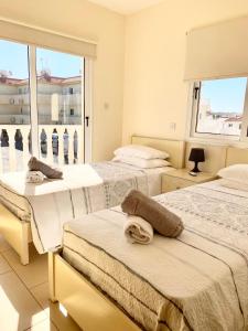 Ένα ή περισσότερα κρεβάτια σε δωμάτιο στο Villa Oceania +29 φωτογραφίες