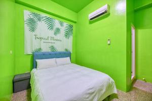 Llit o llits en una habitació de Chunfa B&B