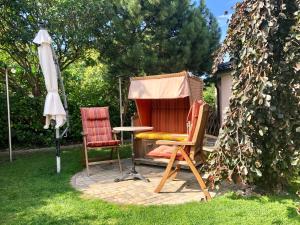Κήπος έξω από το Ferienhaus Swantje