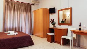 TV a/nebo společenská místnost v ubytování Hotel Apanema