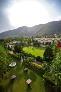 an aerial view of a park with a fountain at Hotel Prem Villas Pushkar in Pushkar