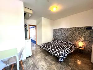 Postel nebo postele na pokoji v ubytování Residence Frontemare