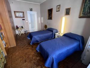 Postel nebo postele na pokoji v ubytování camera Santa Rita