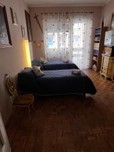 Postel nebo postele na pokoji v ubytování camera Santa Rita