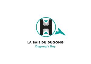 a logo for a dmg dmg du diverging diving bay at Les Hauteurs de la Baie in Noumea