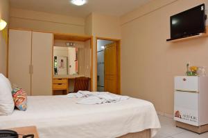 Televisyen dan/atau pusat hiburan di Arthur Palace Hotel