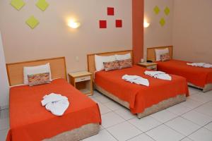 Katil atau katil-katil dalam bilik di Arthur Palace Hotel