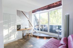Posezení v ubytování Landhaus am See + 37 fotografií