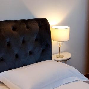 A bed or beds in a room at San Marco View