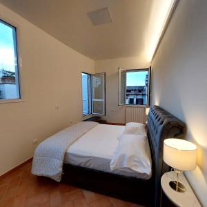 A bed or beds in a room at San Marco View