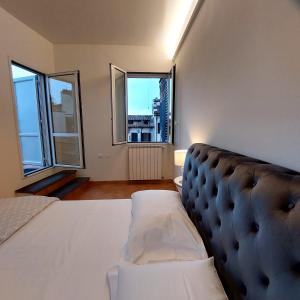 A bed or beds in a room at San Marco View