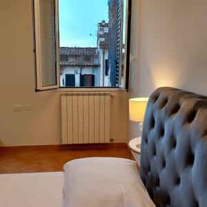 A bed or beds in a room at San Marco View