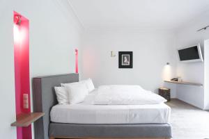 Postel nebo postele na pokoji v ubytování Landhaus am See