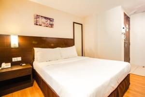Postel nebo postele na pokoji v ubytování PP Hotel