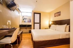 Postel nebo postele na pokoji v ubytování PP Hotel