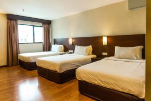 Postel nebo postele na pokoji v ubytování PP Hotel