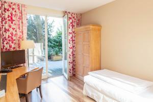 Postel nebo postele na pokoji v ubytování Landhaus am See