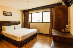 Postel nebo postele na pokoji v ubytování PP Hotel