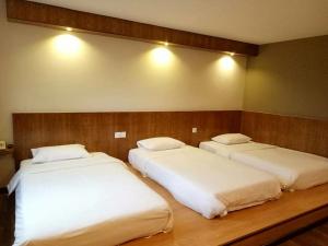 Postel nebo postele na pokoji v ubytování PP Hotel