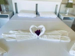 A bed or beds in a room at Villa Oceanview Vicky