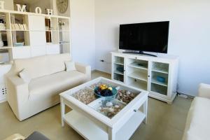 A television and/or entertainment centre at Villa Oceanview Vicky