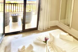 A bed or beds in a room at Villa Oceanview Vicky