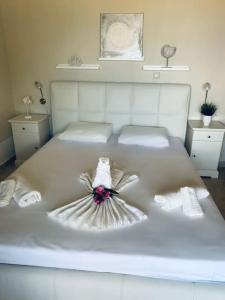 A bed or beds in a room at Villa Oceanview Vicky