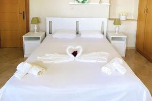 A bed or beds in a room at Villa Oceanview Vicky