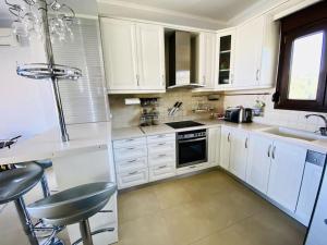 A kitchen or kitchenette at Villa Oceanview Vicky