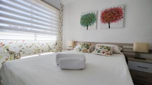Posteľ alebo postele v izbe v ubytovaní BENICALA sea view apartment
