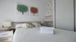 Posteľ alebo postele v izbe v ubytovaní BENICALA sea view apartment