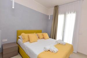 A bed or beds in a room at Torre Difyos