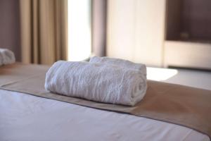 A bed or beds in a room at Torre Difyos
