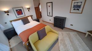 Postel nebo postele na pokoji v ubytování Achalochan House
