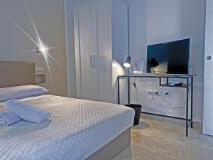 Postel nebo postele na pokoji v ubytování Leone Suite B&B & Restaurant