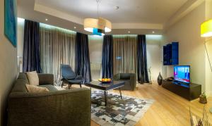 TV a/nebo společenská místnost v ubytování Armoni Residence Istanbul