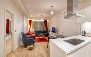 TV a/nebo společenská místnost v ubytování Armoni Residence Istanbul