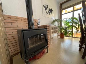 TV a/nebo společenská místnost v ubytování El Mirador de El Paso - Vistas y piscina