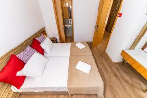 Postel nebo postele na pokoji v ubytování Olá Vida - Hostel Caminha