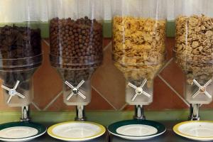 a group of three wine glasses filled with different types of food at Mira Parque in Albufeira