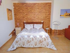 Postel nebo postele na pokoji v ubytování Oro&Mattia's House