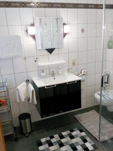 Koupelna v ubytování FEWO Traut + 19 fotografií