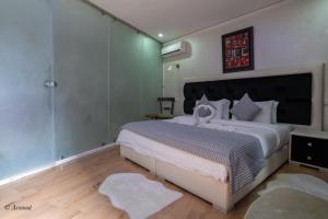 Voodi või voodid majutusasutuse Hôtel ZIRYAB toas