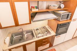 A kitchen or kitchenette at Casa Lilliosa