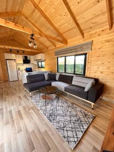 a large living room with a couch and a table at KARYA TREE HOUSE in Dalaman
