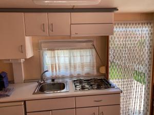 מטבח או מטבחון ב-Chalet-home familiar "CAL DENVER" "Pet friendly"