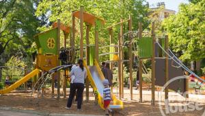 a group of people playing on a playground at Cosy house in Le Petit-Quevilly